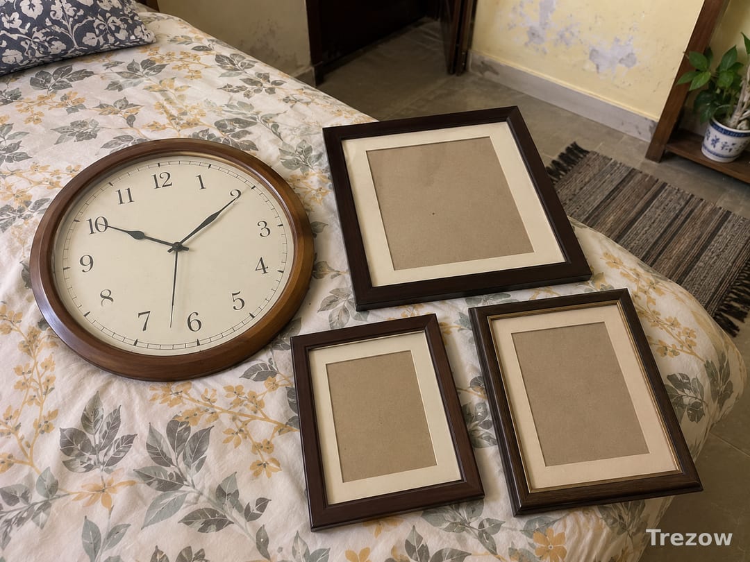 Wall clock with three photo frames