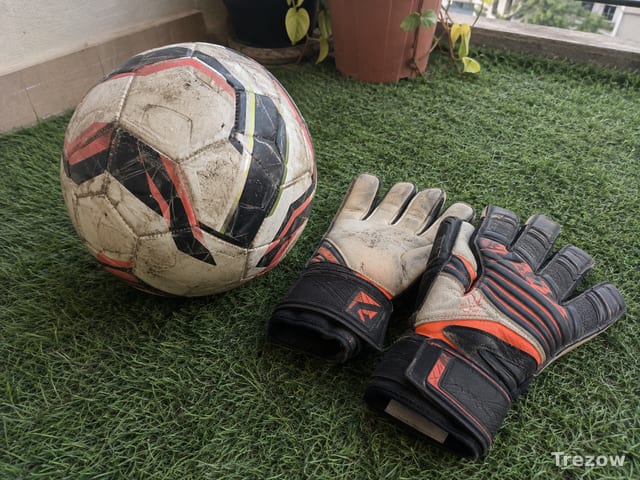 Football with goalkeeper gloves