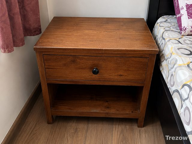 Wooden bedside table with drawer