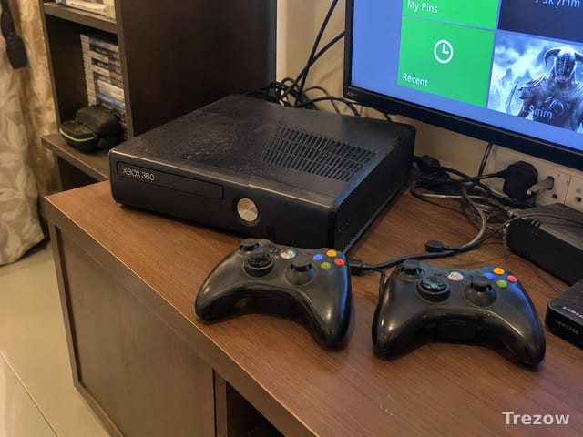 Xbox 360 with two controllers